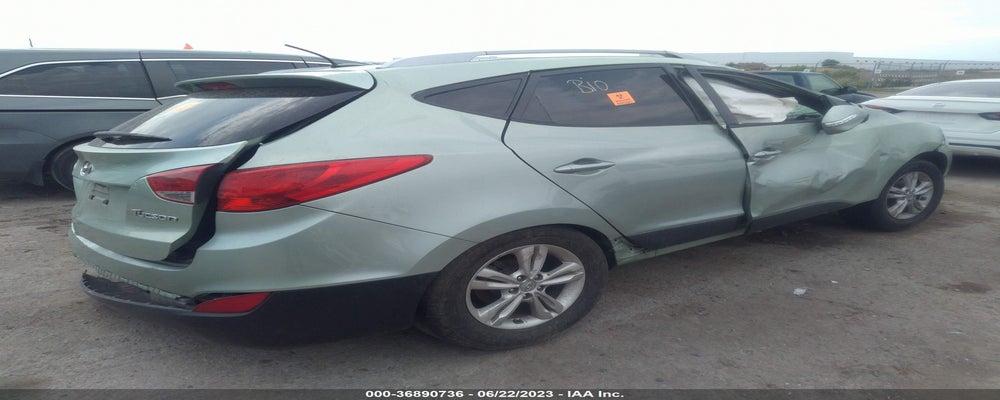 KM8JU3AC0DU561862 2013 HYUNDAI TUCSON photo no. 4