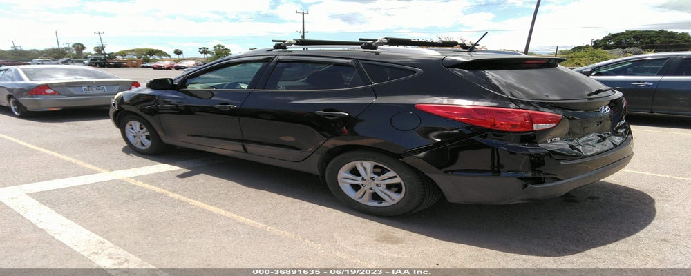 KM8JU3AC4DU742107 2013 HYUNDAI TUCSON photo no. 3