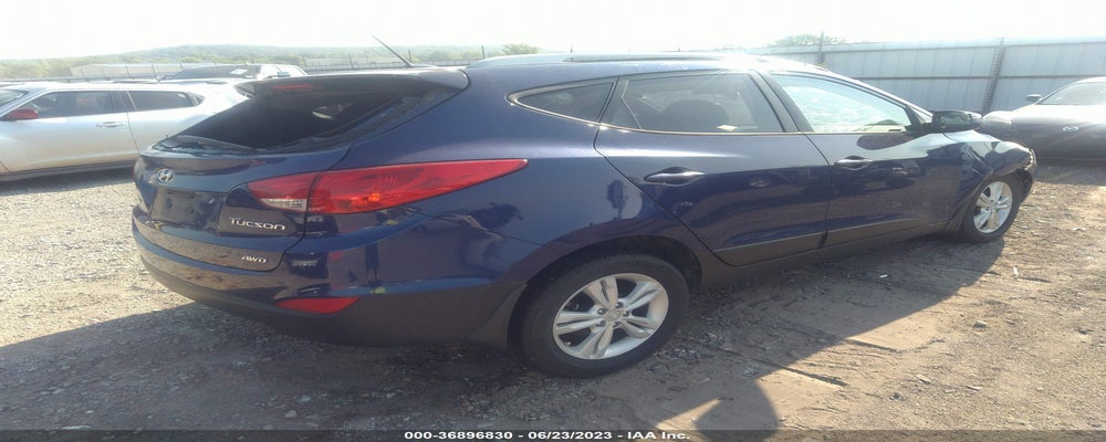 KM8JUCAC6DU582778 2013 HYUNDAI TUCSON photo no. 4