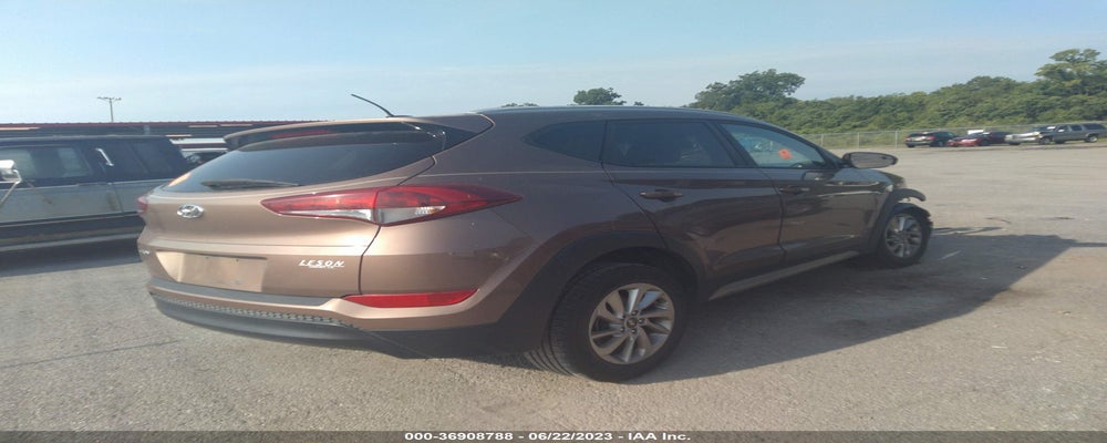 KM8J33A44HU334918 2017 HYUNDAI TUCSON photo no. 4