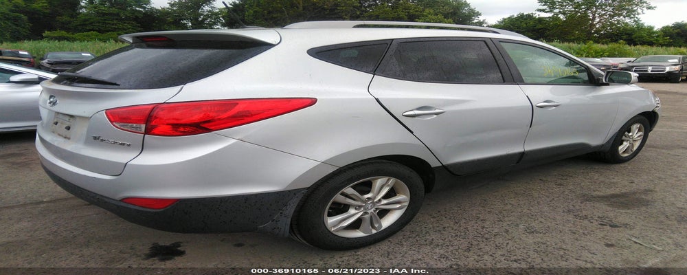 KM8JU3AC2CU459154 2012 HYUNDAI TUCSON photo no. 4