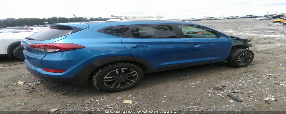 KM8J33A43GU188218 2016 HYUNDAI TUCSON photo no. 4