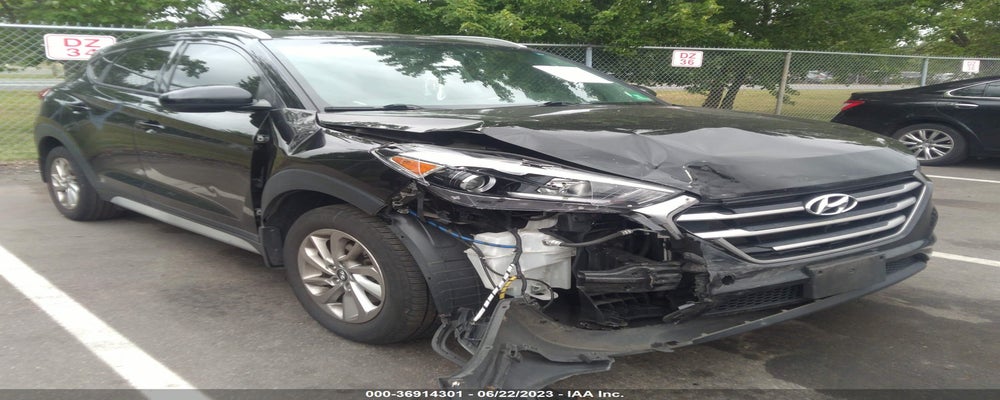 KM8J3CA47HU400345 2017 HYUNDAI TUCSON photo no. 4