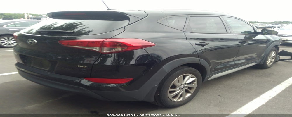 KM8J3CA47HU400345 2017 HYUNDAI TUCSON photo no. 4