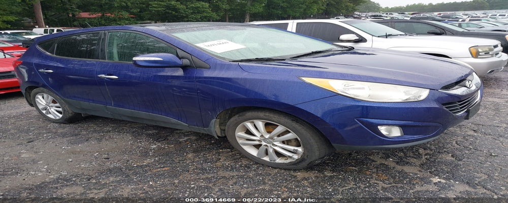 KM8JUCAC1DU604864 2013 HYUNDAI TUCSON photo no. 11