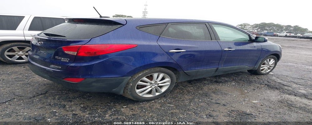 KM8JUCAC1DU604864 2013 HYUNDAI TUCSON photo no. 4