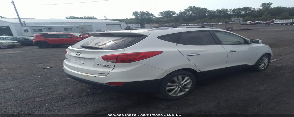KM8JUCAC5DU693662 2013 HYUNDAI TUCSON photo no. 4