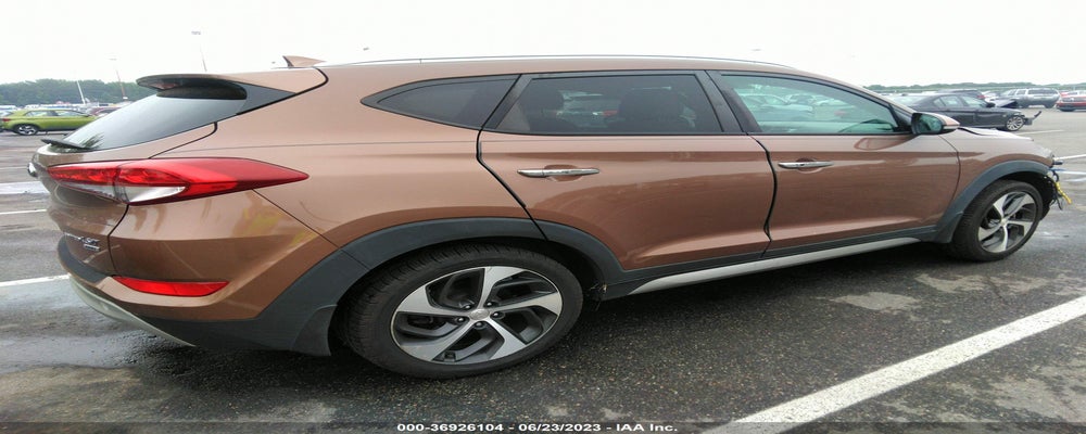 KM8J3CA25HU357106 2017 HYUNDAI TUCSON photo no. 4