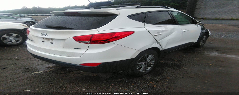 KM8JUCAGXEU932823 2014 HYUNDAI TUCSON photo no. 4