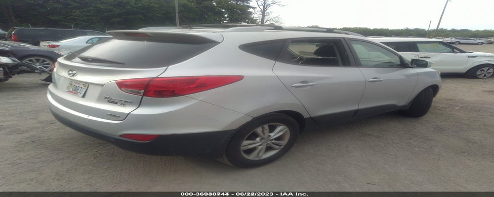 KM8JUCAC3DU591034 2013 HYUNDAI TUCSON photo no. 4