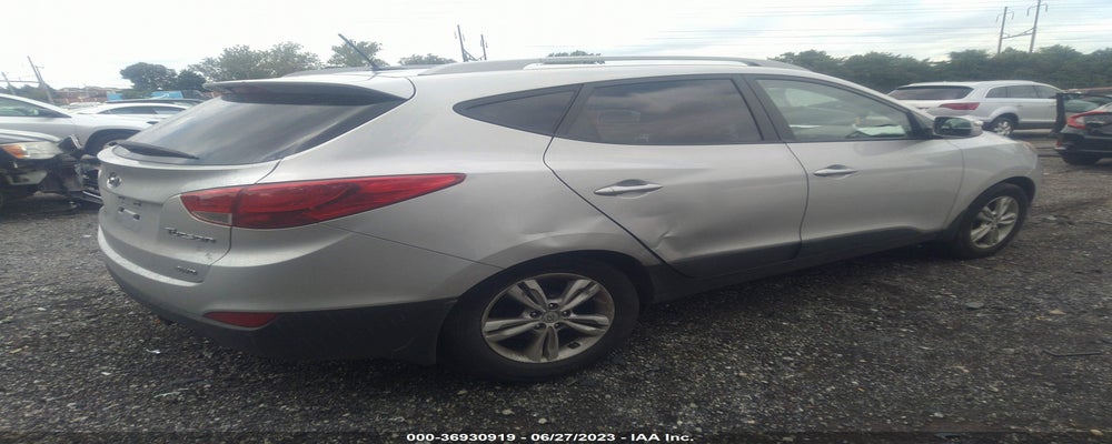KM8JUCAC6DU558545 2013 HYUNDAI TUCSON photo no. 4