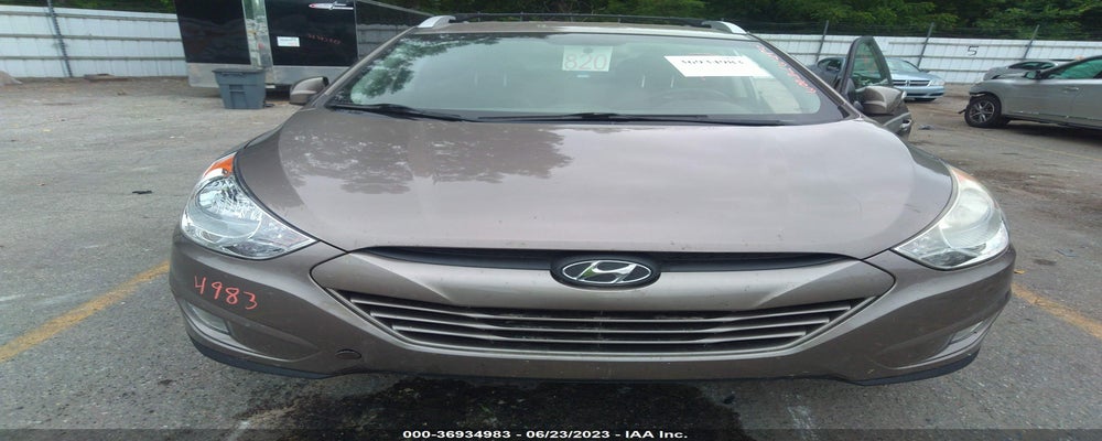 KM8JUCAC7DU622883 2013 HYUNDAI TUCSON photo no. 6