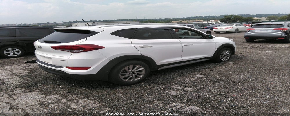 KM8J3CA49HU569850 2017 HYUNDAI TUCSON photo no. 4