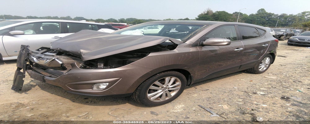 KM8JUCAC5CU445698 2012 HYUNDAI TUCSON photo no. 2