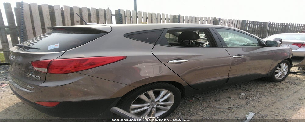 KM8JUCAC5CU445698 2012 HYUNDAI TUCSON photo no. 4