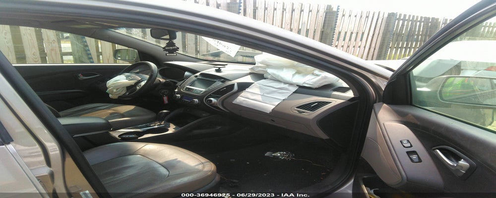 KM8JUCAC5CU445698 2012 HYUNDAI TUCSON photo no. 5