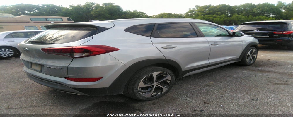 KM8J33A23HU373515 2017 HYUNDAI TUCSON photo no. 4