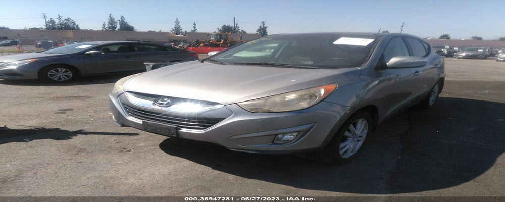 KM8JU3AC4CU530872 2012 HYUNDAI TUCSON photo no. 2