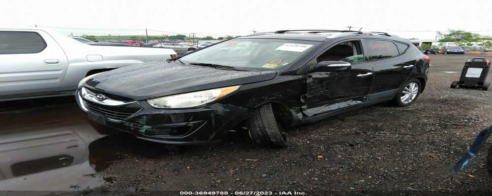 KM8JUCAC4CU539295 2012 HYUNDAI TUCSON photo no. 2
