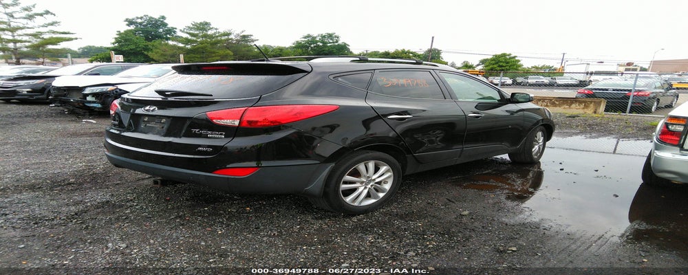 KM8JUCAC4CU539295 2012 HYUNDAI TUCSON photo no. 4