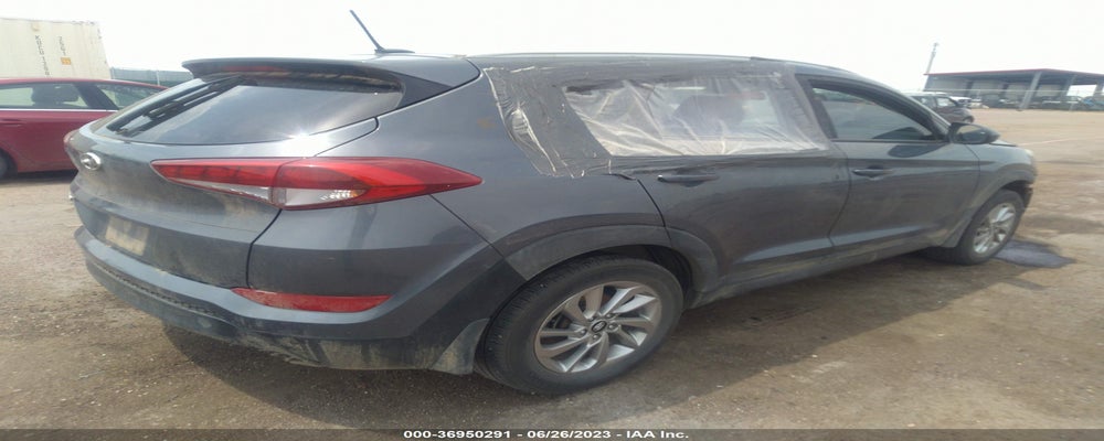 KM8J33A41GU182904 2016 HYUNDAI TUCSON photo no. 4