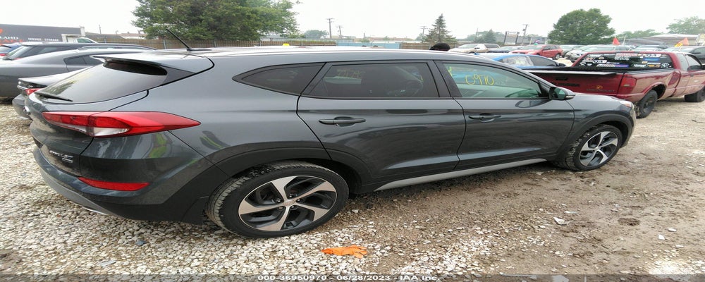 KM8J3CA26HU380135 2017 HYUNDAI TUCSON photo no. 4