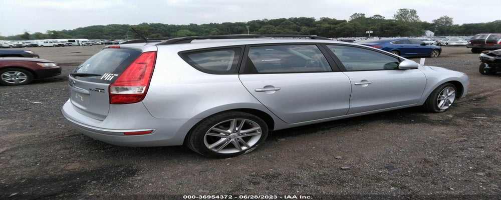 KMHDC8AE6AUO57472 2010 HYUNDAI ELANTRA TOURING photo no. 4
