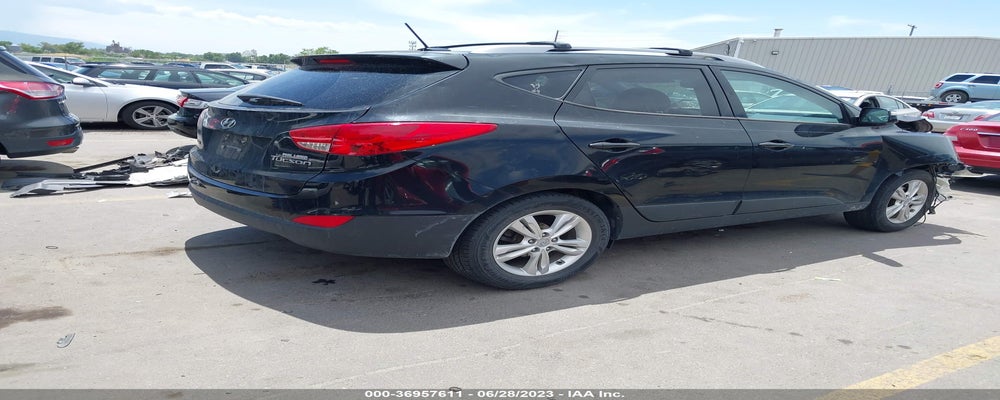 KM8JU3AC5DU592850 2013 HYUNDAI TUCSON photo no. 4
