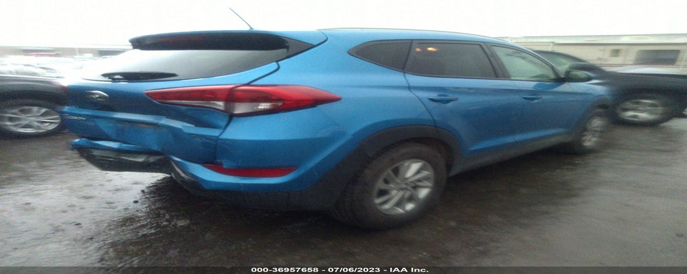 KM8J33A40GU069879 2016 HYUNDAI TUCSON photo no. 4