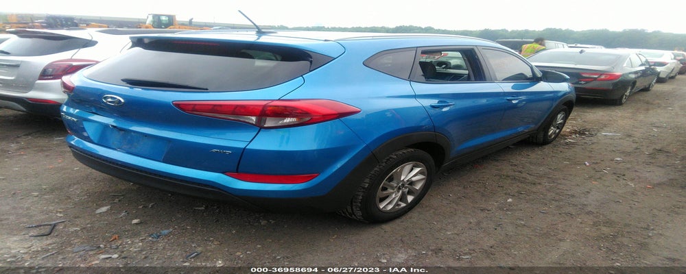 KM8J3CA48GU090737 2016 HYUNDAI TUCSON photo no. 4