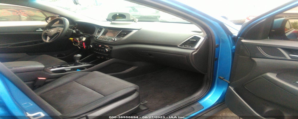 KM8J3CA48GU090737 2016 HYUNDAI TUCSON photo no. 5