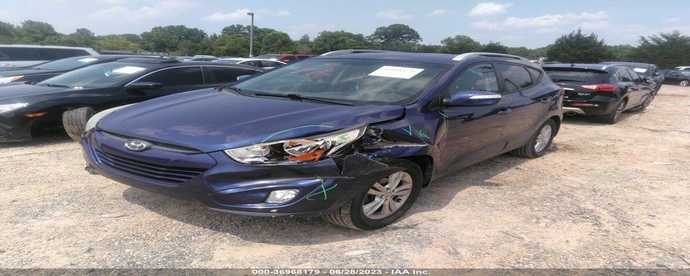KM8JU3AC9DU594455 2013 HYUNDAI TUCSON photo no. 2