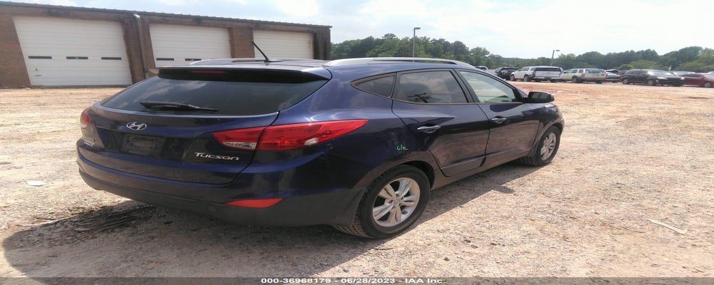 KM8JU3AC9DU594455 2013 HYUNDAI TUCSON photo no. 4