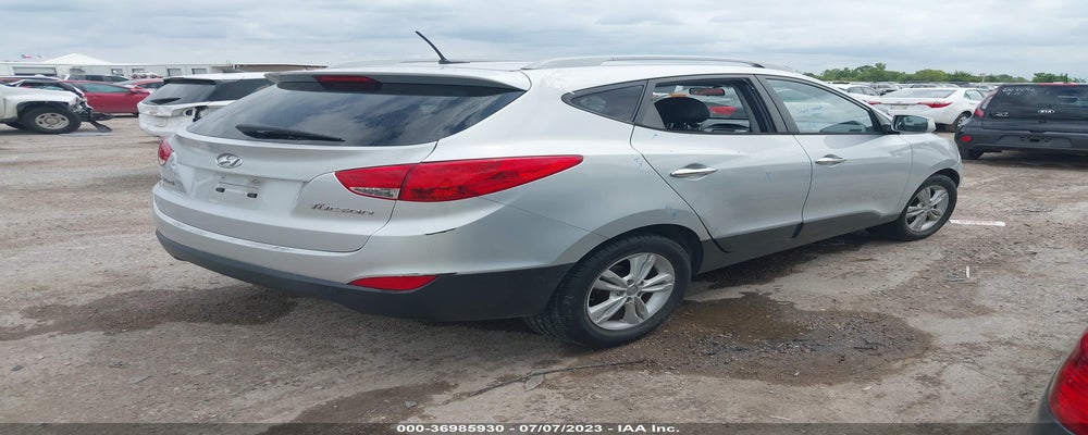 KM8JU3AC7AU095620 2010 HYUNDAI TUCSON photo no. 4