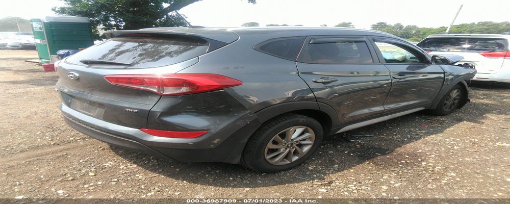 KM8J3CA41HU574220 2017 HYUNDAI TUCSON photo no. 4