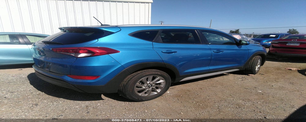 KM8J33A4XHU489909 2017 HYUNDAI TUCSON photo no. 4