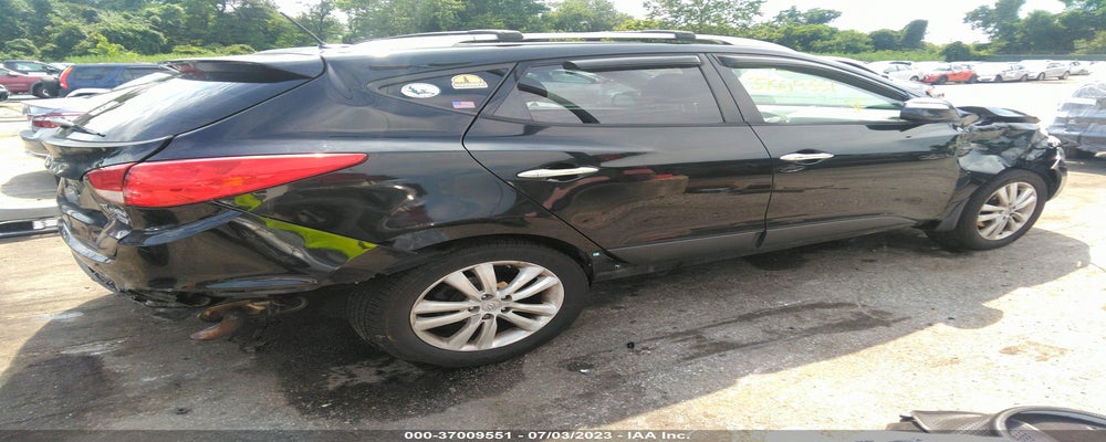 KM8JU3AC7DU715385 2013 HYUNDAI TUCSON photo no. 4