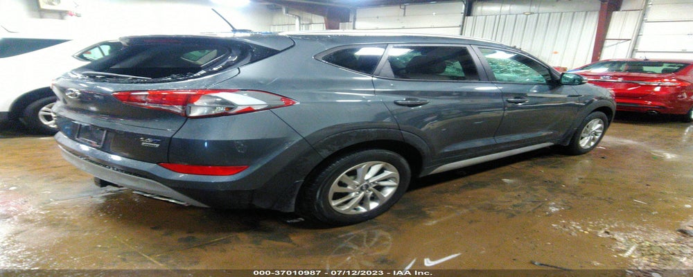 KM8J3CA25HU310898 2017 HYUNDAI TUCSON photo no. 4
