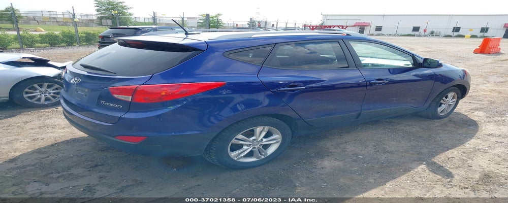 KM8JU3AC8CU442648 2012 HYUNDAI TUCSON photo no. 4