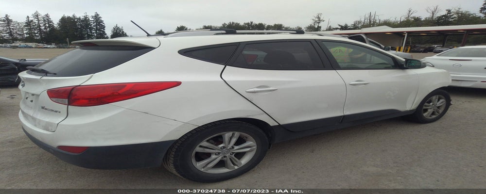 KM8JU3AC1CU468475 2012 HYUNDAI TUCSON photo no. 4
