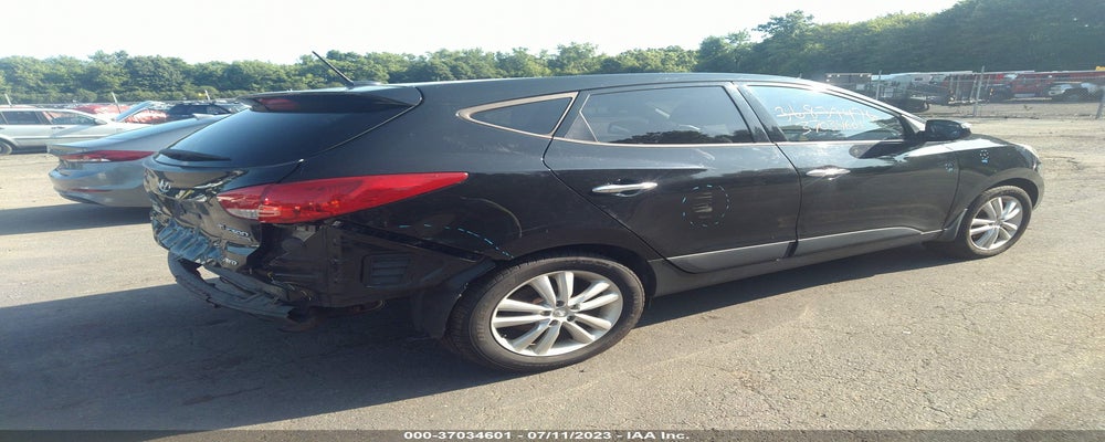 KM8JUCAC9CU436034 2012 HYUNDAI TUCSON photo no. 4