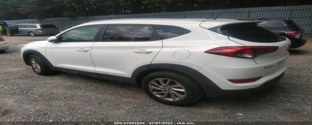 KM8J3CA44GU104195 2016 HYUNDAI TUCSON photo no. 3