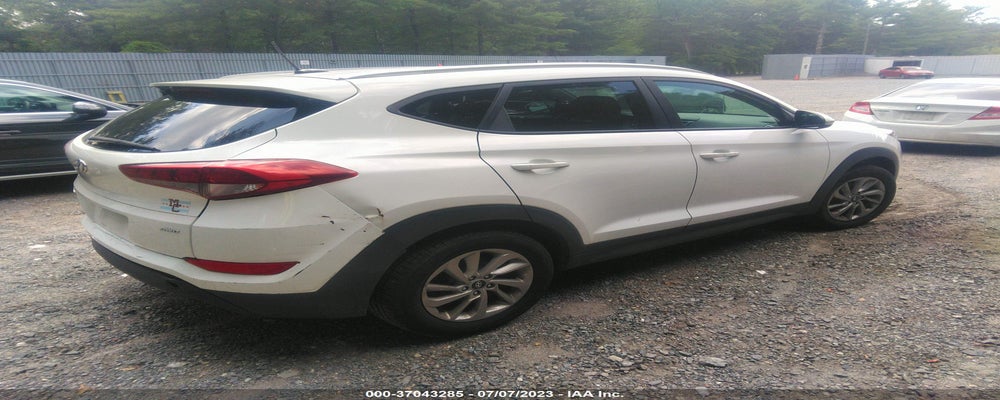 KM8J3CA44GU104195 2016 HYUNDAI TUCSON photo no. 4