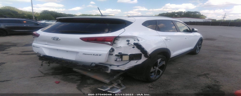 KM8J33A20GU038985 2016 HYUNDAI TUCSON photo no. 4