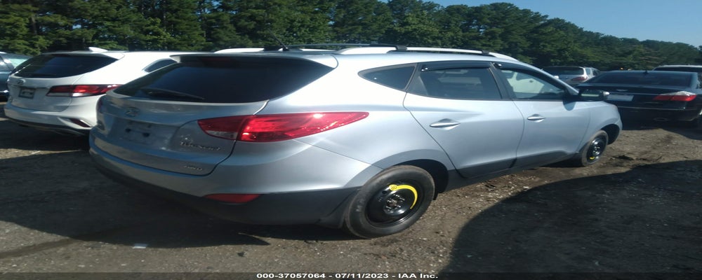 KM8JUCAC2CU461275 2012 HYUNDAI TUCSON photo no. 4