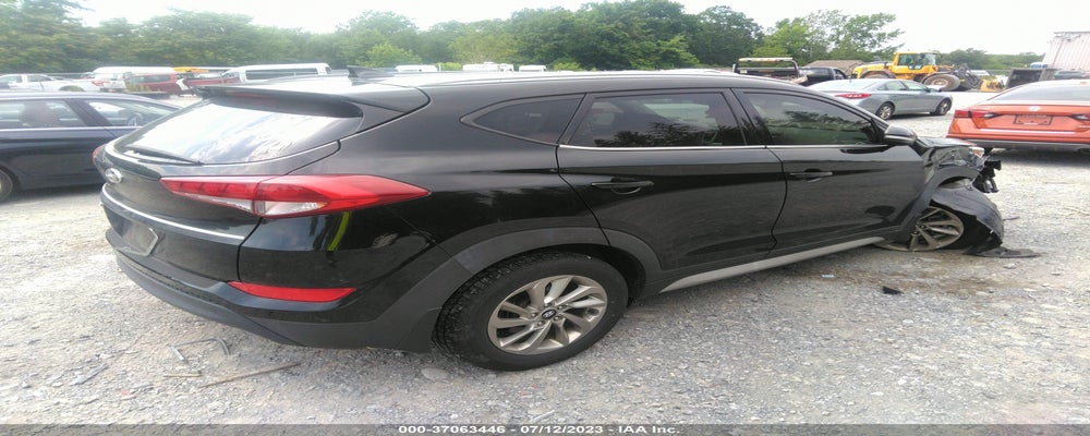 KM8J33A42HU519226 2017 HYUNDAI TUCSON photo no. 4