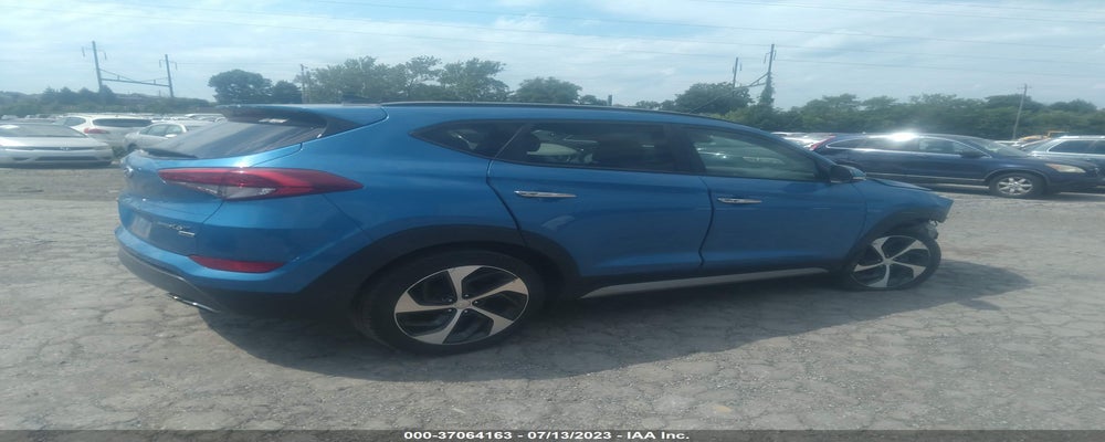 KM8J3CA20HU303115 2017 HYUNDAI TUCSON photo no. 4