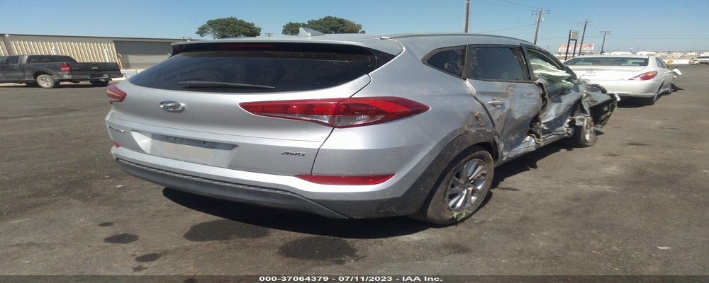 KM8J3CA42JU769698 2018 HYUNDAI TUCSON photo no. 4