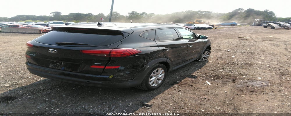 KM8J3CA44KU040037 2019 HYUNDAI TUCSON photo no. 4