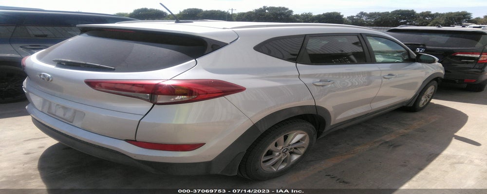 KM8J33A44GU236339 2016 HYUNDAI TUCSON photo no. 4